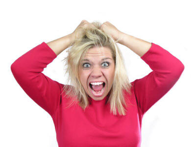 woman pulling hair out